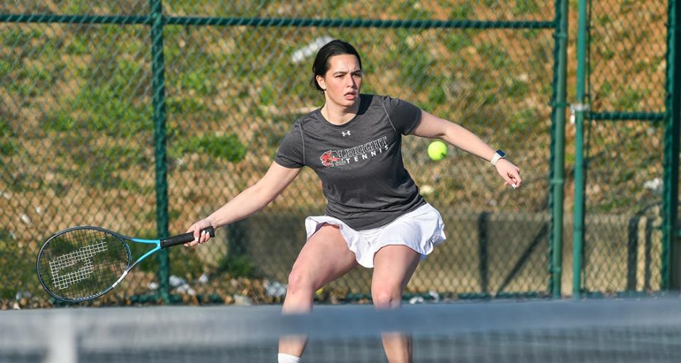 Megan Misurelli competing for the Albright College tennis team.