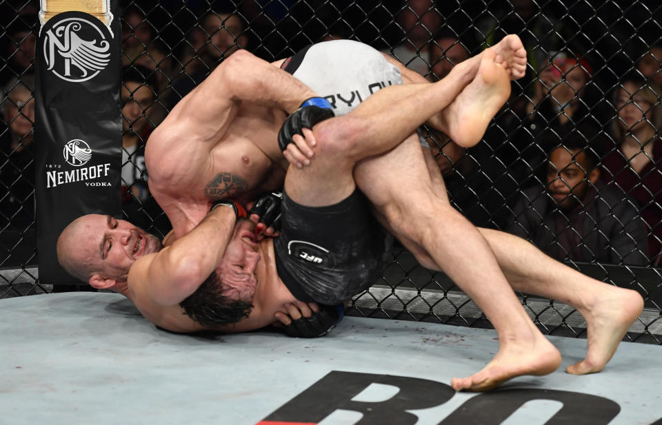 VANCOUVER, BRITISH COLUMBIA - SEPTEMBER 14:  (L-R) Glover Teixeira of Brazil attempts a guillotine choke submission against Nikita Krylov of Ukraine in their light heavyweight bout during the UFC Fight Night event at Rogers Arena on September 14, 2019 in Vancouver, Canada. (Photo by Jeff Bottari/Zuffa LLC/Zuffa LLC)