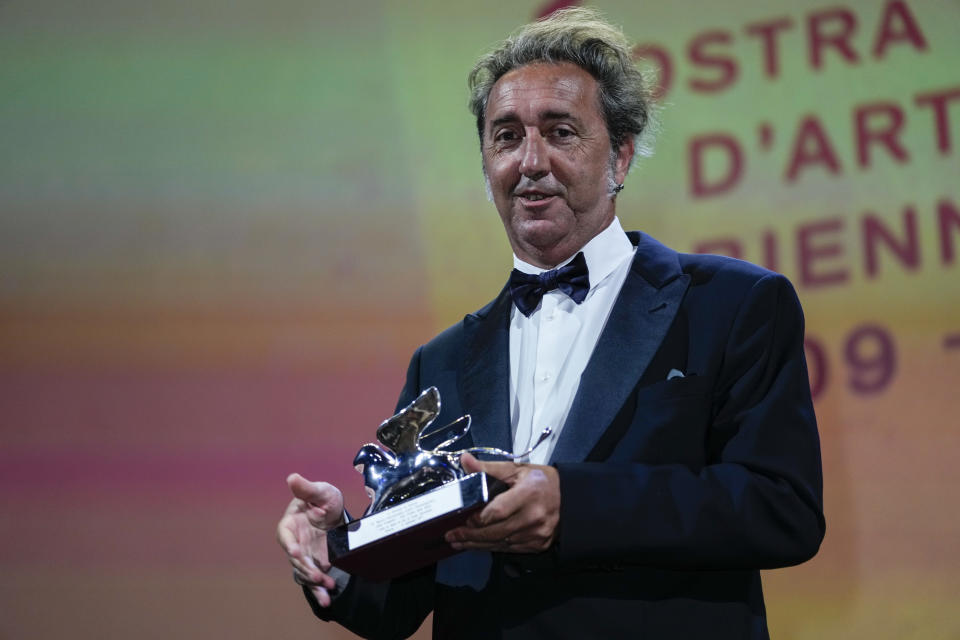 Paolo Sorrentino holds the Silver Lion Grand Jury Prize for 'The Hand Of God' onstage at the closing ceremony during the 78th edition of the Venice Film Festival in Venice, Italy, Saturday, Sept. 11, 2021. (AP Photo/Domenico Stinellis)