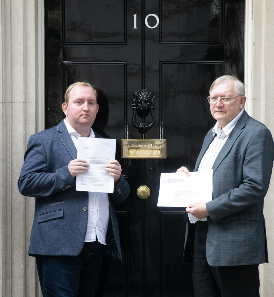 Adam and David Bradford went to Downing Street with their charity's dossier of research to show the risks of young people developing a gambling addiction. (Supplied)