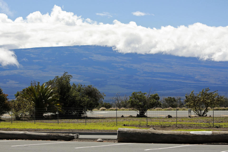 Mauna Loa is seen from the Gilbert Kahele Recreation Area off Saddle Road on the Big Island of Hawaii on Oct. 27, 2022. The ground is shaking and swelling at Mauna Loa, the largest active volcano in the world, indicating that it could erupt. Scientists say they don't expect that to happen right away but officials on the Big Island are telling residents to be prepared in case it does erupt soon. (AP Photo/Megan Moseley)