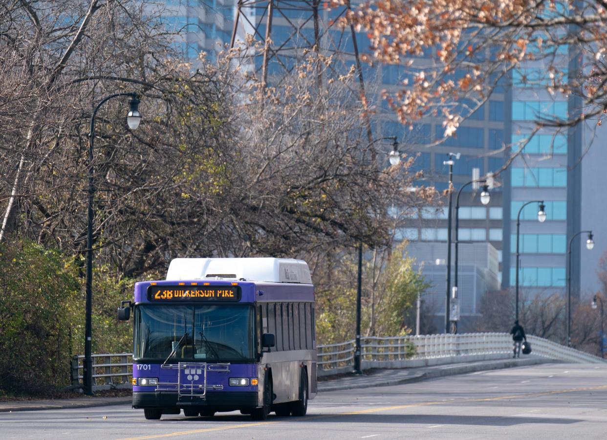 A WeGo Public Transit bus crosses the Woodland Street Police Memorial Bridge in Nashville, Tenn., Tuesday, Dec. 5, 2023. Nashville Mayor Freddie O'Connell put it to the voters to OK a tax hike to fund mass transit projects.