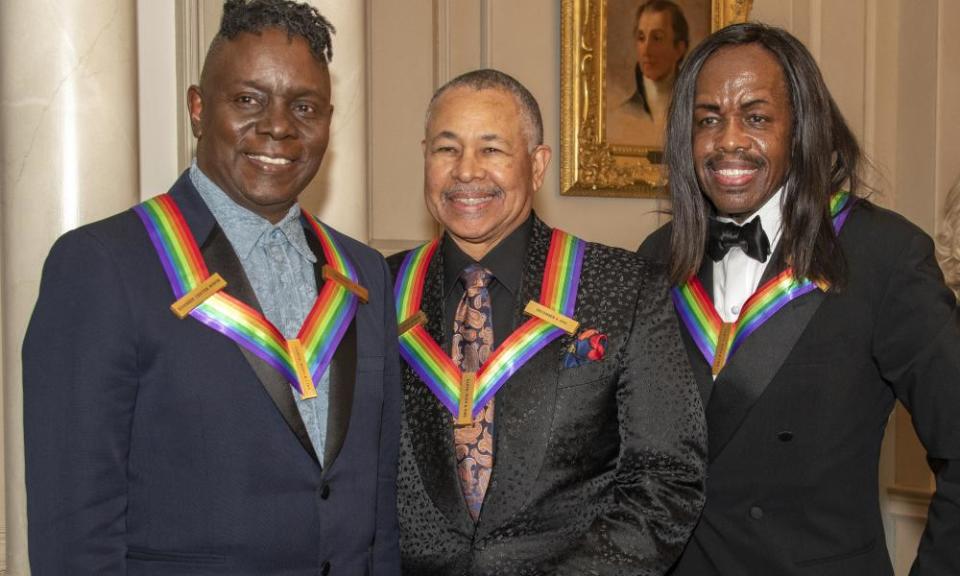 Members of the band Earth, Wind & Fire, from left to right, singer Philip Bailey, percussionist Ralph Johnson and bassist Verdine White, three of the recipients of the 42nd Annual Kennedy Center Honors.