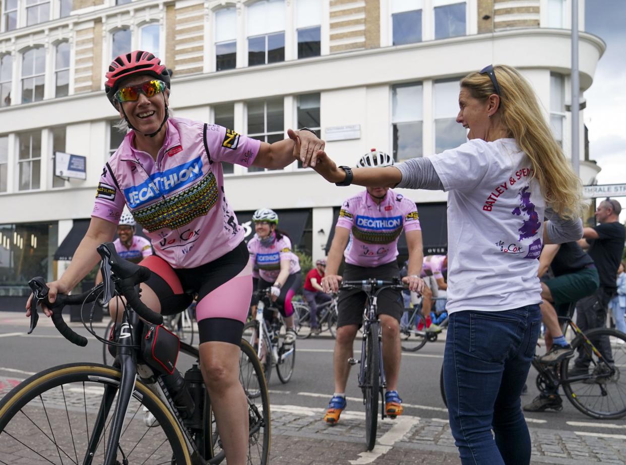 Batley & Spen MP Kim Leadbeater greets the Jo Cox Way cyclists, a group of 70 mixed ability cyclists, at Flat Iron Square in Southwark, London, following their five-day journey from West Yorkshire (Steve Parsons/PA) (PA Wire)