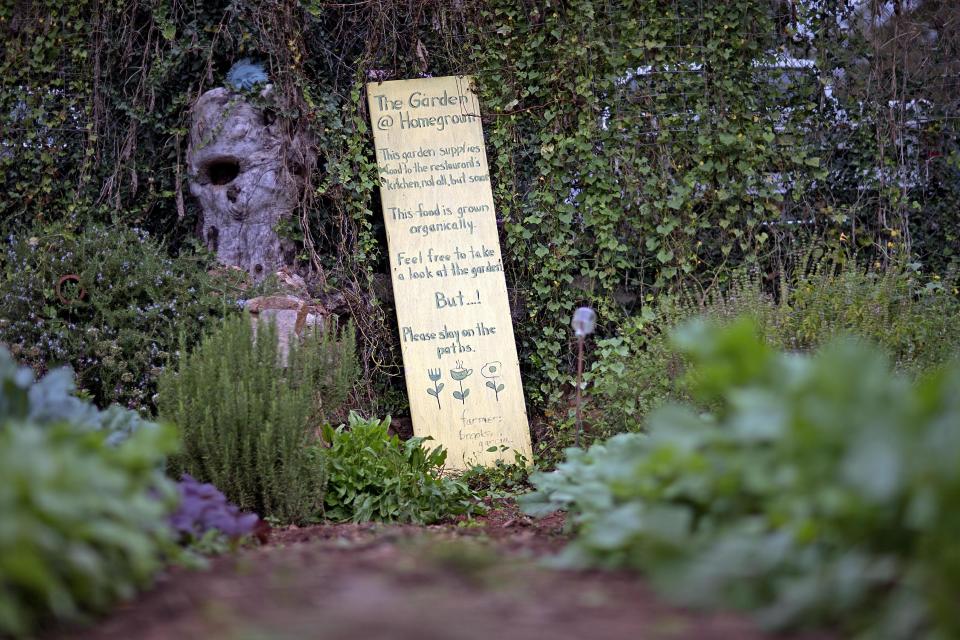 An organic garden sits behind the Home grown restaurant, Tuesday, Oct. 22, 2013, in Atlanta. Home grown offers locally sourced Southern dishes for breakfast and lunch in a quirky, no-frills setting that feels comfortable no matter who you are. (AP Photo/David Goldman) (AP Photo/David Goldman)