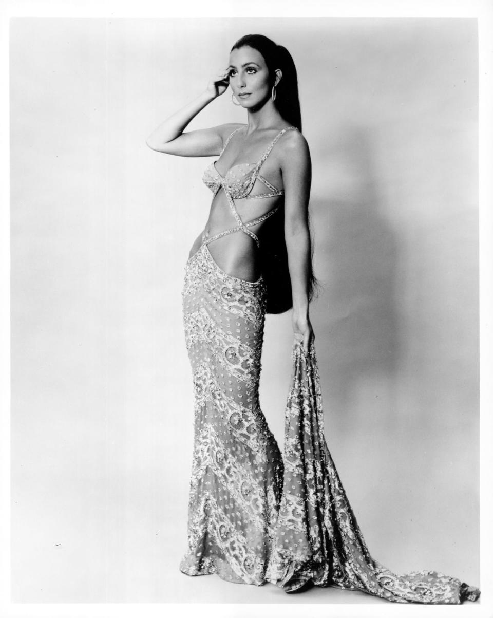 <p>In a cutout gown for a portrait session during the <em>The Sonny and Cher Show </em>years. </p>