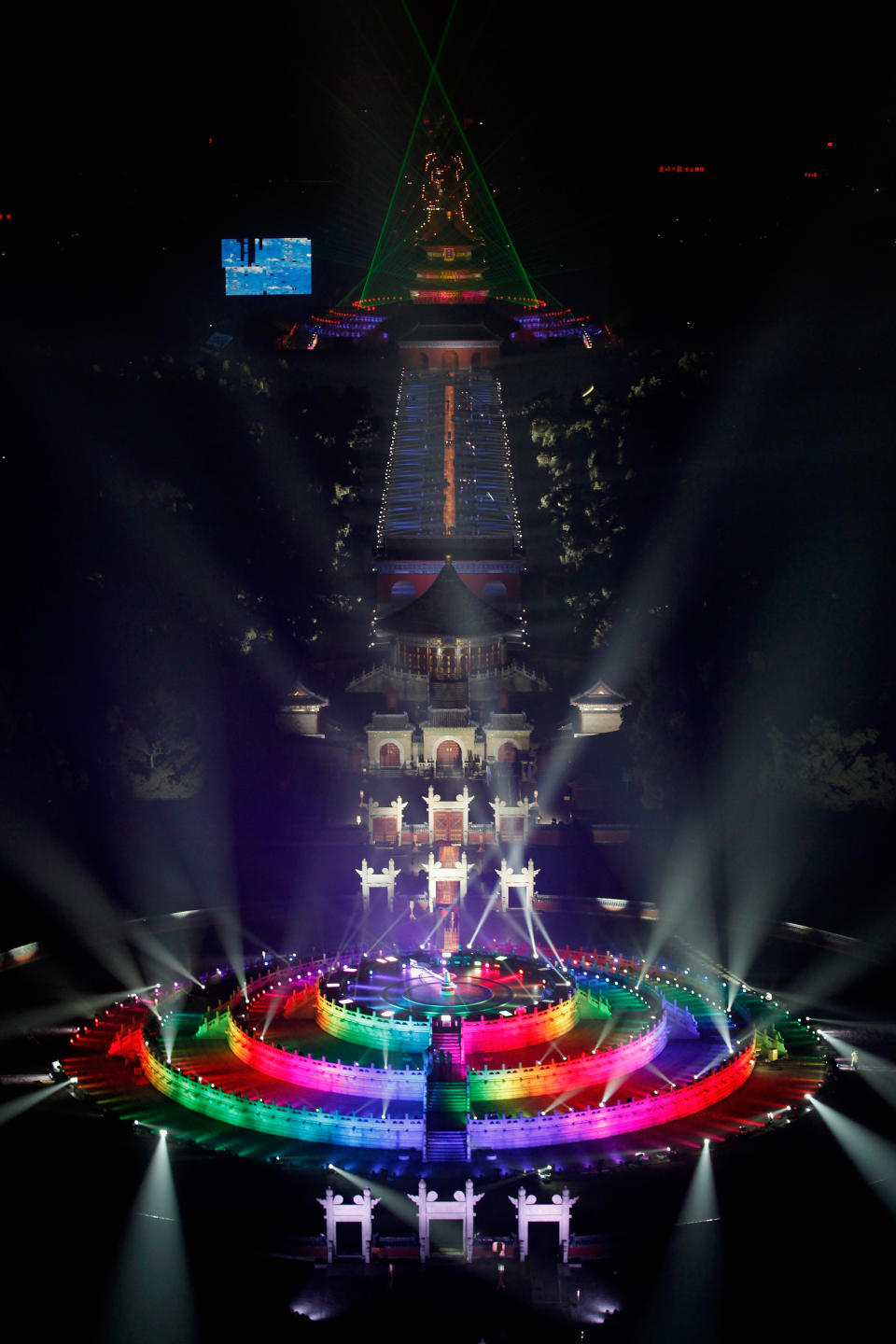 BEIJING, CHINA - DECEMBER 31: The Circular Mound is illuminated as Beijing celebrates the New Year's Eve at the Temple of Heaven Park on December 31, 2011 in Beijing, China. The new year, 2012 begins at midnight. (Photo by Lintao Zhang/Getty Images)