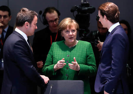 Luxembourg Prime Minister Xavier Bettel, German Chancellor Angela Merkel and Austrian Chancellor Sebastian Kurz attend a European Union leaders informal summit in Brussels, Belgium, February 23, 2018. REUTERS/Yves Herman