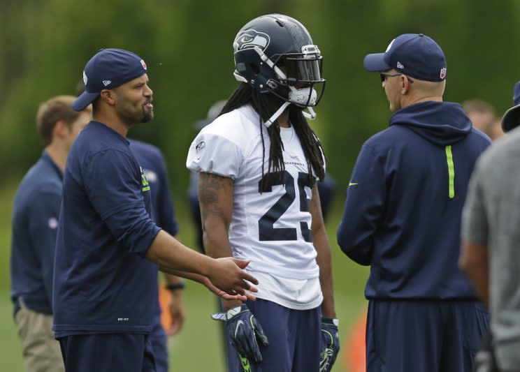 Richard Sherman denied there's any issue between him and Russell Wilson. (AP)