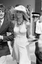 <p>A young Tennis fan enjoys the Wimbledon Tennis Championships of 1973. </p>