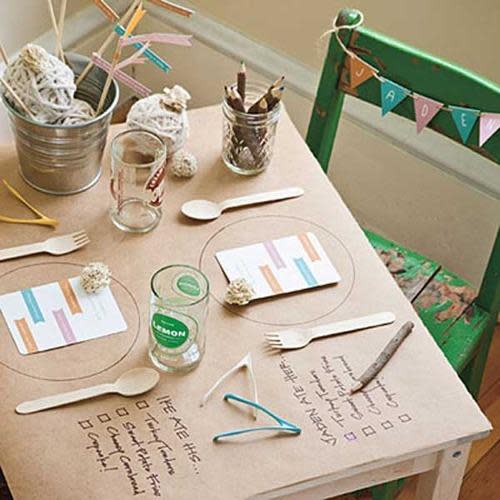 kids thanksgiving table with butcher paper cover