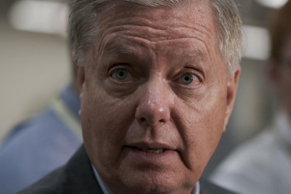 Senate Judiciary Committee Chairman Lindsey Graham, R-S.C., takes questions from reporters following a closed-door briefing on Iran, at the Capitol in Washington, Wednesday, Sept. 25, 2019. (AP Photo/J. Scott Applewhite)