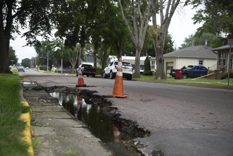 A view of North Cedar Street on August 13th, 2024. When Canton received more than a foot of rain between June 20-22, water rushed down North Cedar Street and damaged the asphalt.