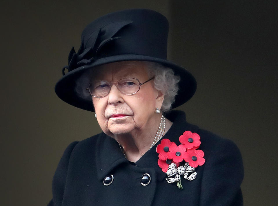 LONDON, ENGLAND - NOVEMBER 08: Queen Elizabeth II looks on during the Service of Remembrance at the Cenotaph at The Cenotaph on November 08, 2020 in London, England. Remembrance Sunday services are still able to go ahead despite the covid-19 measures in place across the various nations of the UK. Each country has issued guidelines to ensure the safety of those taking part. (Photo by Chris Jackson/Getty Images)