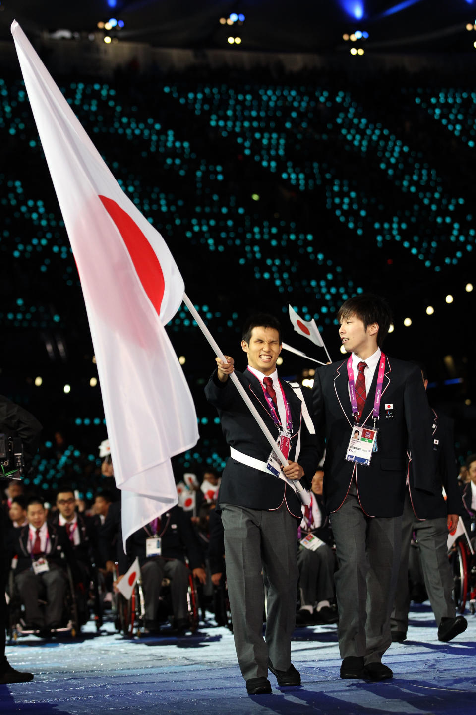 LONDON, ENGLAND - AUGUST 29: Swimmer Keiichi Kimura of Japan carries the flag during the Opening Ceremony of the London 2012 Paralympics at the Olympic Stadium on August 29, 2012 in London, England. (Photo by Dan Kitwood/Getty Images)