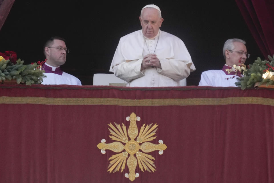 Pope Francis delivers the Urbi et Orbi (Latin for 'to the city and to the world' ) Christmas' day blessing from the main balcony of St. Peter's Basilica at the Vatican, Sunday, Dec. 25, 2022. (AP Photo/Gregorio Borgia)