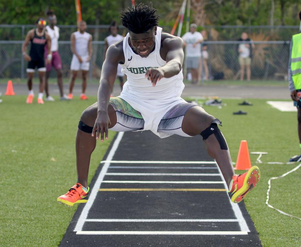 Haines City's DJerry Cajuste competes in the triple jump on Saturday at the Class 4A, Region 2 track and field meet at Alonso High School in Tampa. 