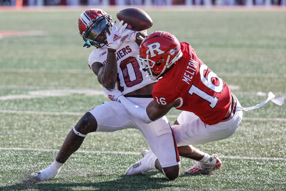 Oct 22, 2022; Piscataway, New Jersey, USA; Rutgers Scarlet Knights defensive back Max Melton (16) breaks up a pas intended for Indiana Hoosiers wide receiver Andison Coby (10) during the second half at SHI Stadium.