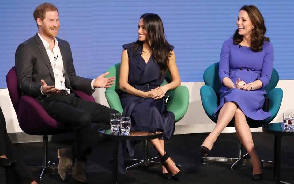 At the forum: Meghan wore a glamorous £1,500 Jason Wu dress, in contrast to Kate's maternity dress from high street brand Seraphine - Chris Jackson