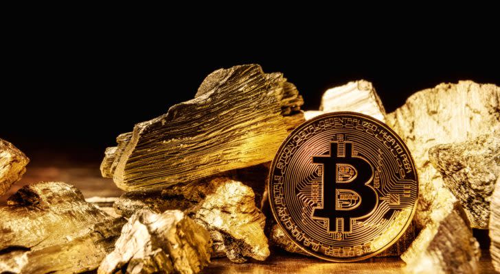 A Bitcoin (BTC) coin surrounded by gold.