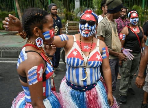 Emigre Papuans living in the Indonesian capital protested in front of the presidential palace in solidarity with disturbances back home