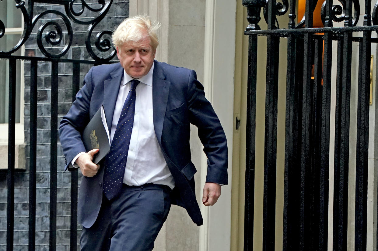 Prime Minister Boris Johnson leaves 10 Downing Street, London, ahead of a COVID-19 media briefing in the Downing Street Briefing Room. Picture date: Tuesday September 14, 2021.