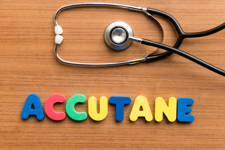 The word accutane spelled out on a desk with a stethoscope above it