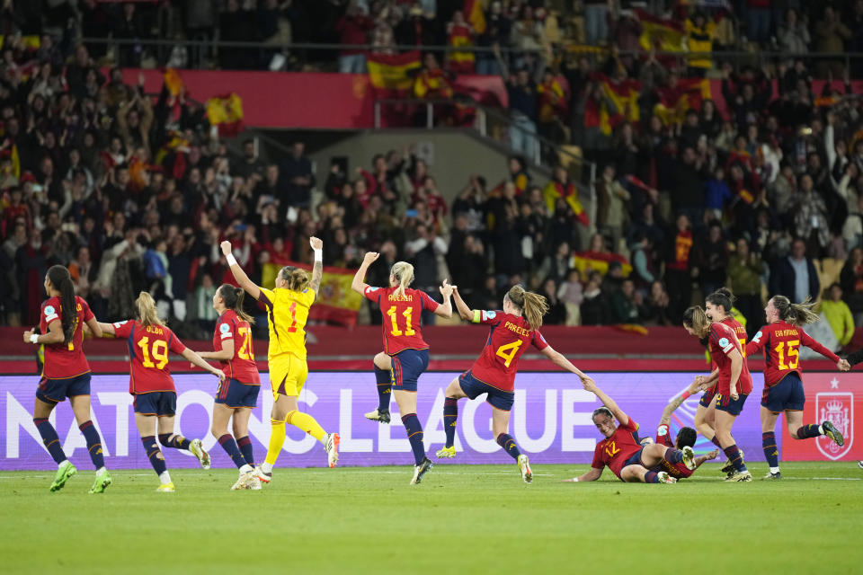 Spain players celebrate after winning the Women's Nations League final soccer match between Spain and France at La Cartuja stadium in Seville, Spain, Wednesday, Feb. 28, 2024. Spain won 2-0. (AP Photo/Jose Breton)