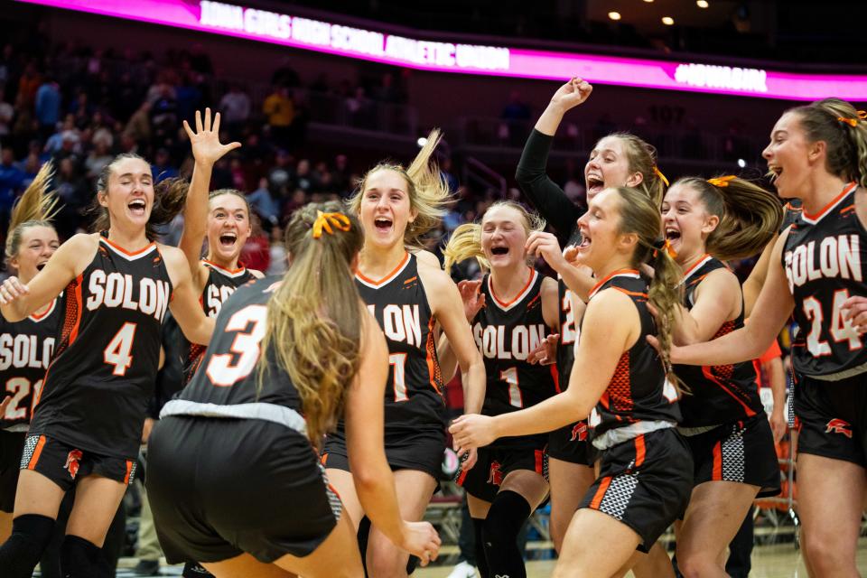 The Solon girls basketball team celebrates advancing to the state title game after defeating Des Moines Christian in the state semifinals on Thursday.