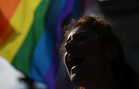 An LGBTI protester demonstrates outside the Pastoral Congress at the World Meeting of Families in Dublin, Ireland August 23, 2018. REUTERS/Clodagh Kilcoyne