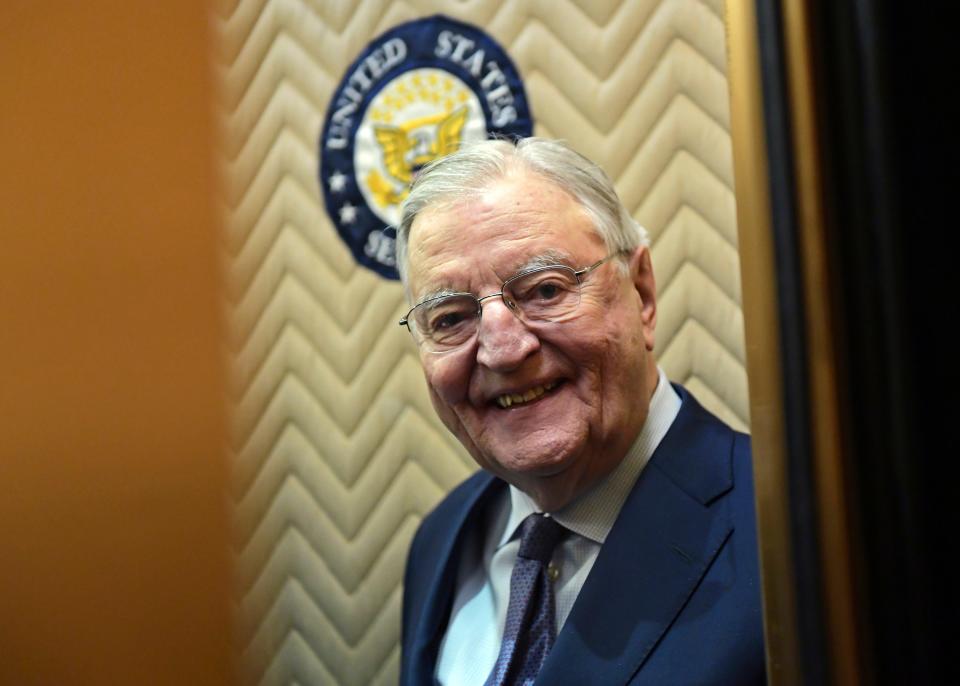 FILE - Former Vice President Walter Mondale smiles as he gets on an elevator on Capitol Hill in Washington, Jan. 3, 2018. Biden plans to speak at a memorial service in Minnesota on Sunday, May 1, for Mondale, who died last April at age 93. (AP Photo/Susan Walsh, File)