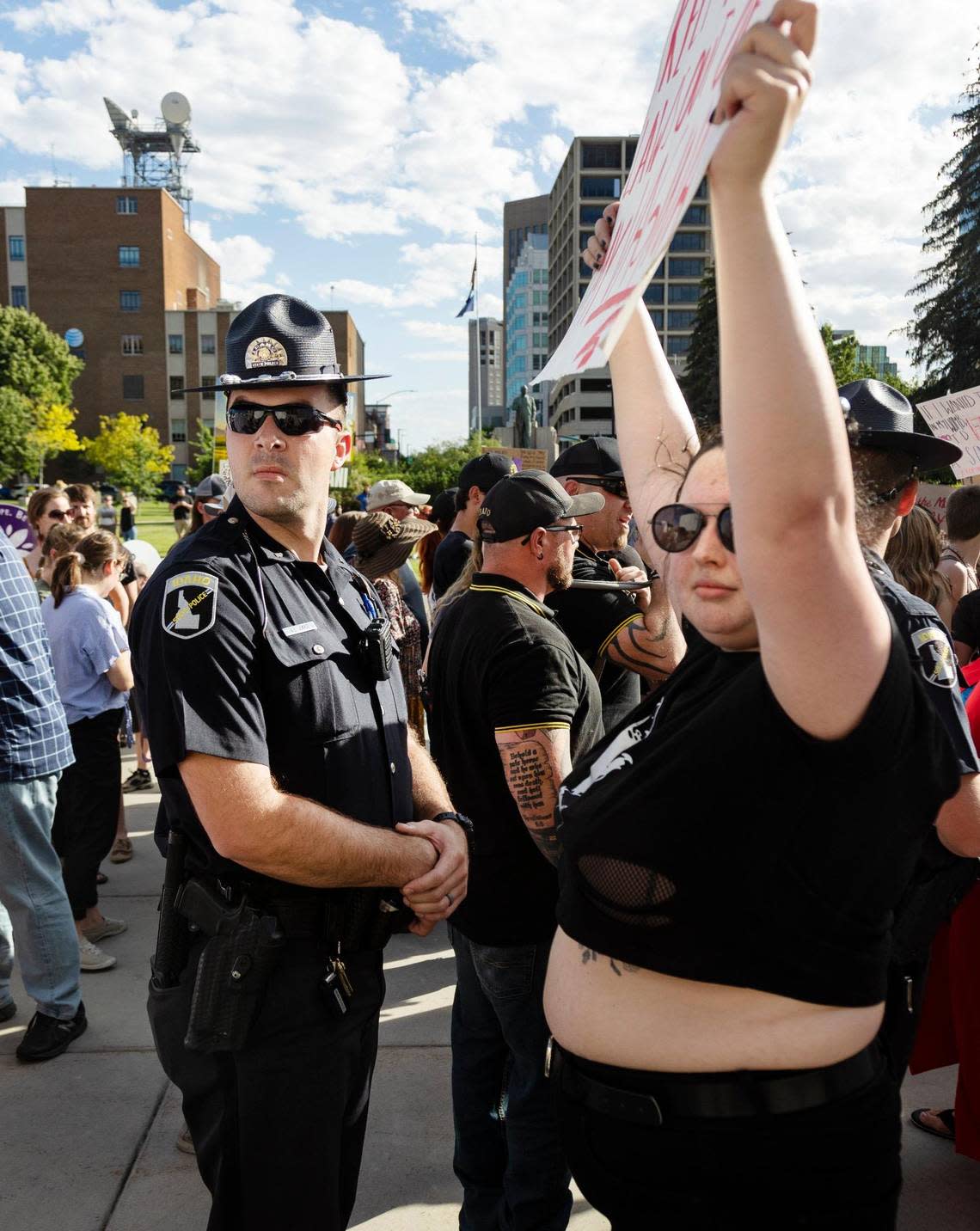 Idaho State Police form a line between those attending a pro-life celebration and protestors who came to support abortion rights at he Idaho Statehouse in Boise on Tuesday, June 28, 2022.