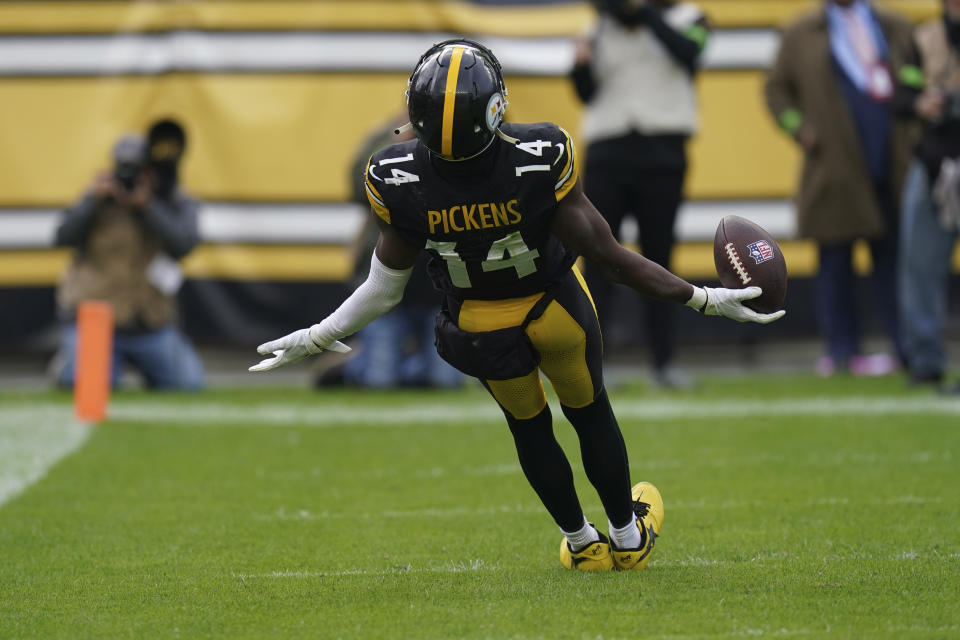 Pittsburgh Steelers wide receiver George Pickens (14) celebrates in the end zone after a touchdown in the second half of an NFL football game against the Baltimore Ravens, in Pittsburgh, Sunday, Oct. 8, 2023. (AP Photo/Matt Freed)