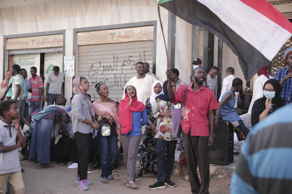 People chant slogans during a protest in Khartoum, amid ongoing demonstrations against a military takeover in Khartoum, Sudan, Thursday, Nov. 4, 2021. (AP Photo/Marwan Ali)