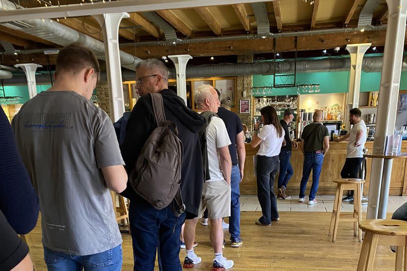 The single file queue at The Fox in Custom House, London