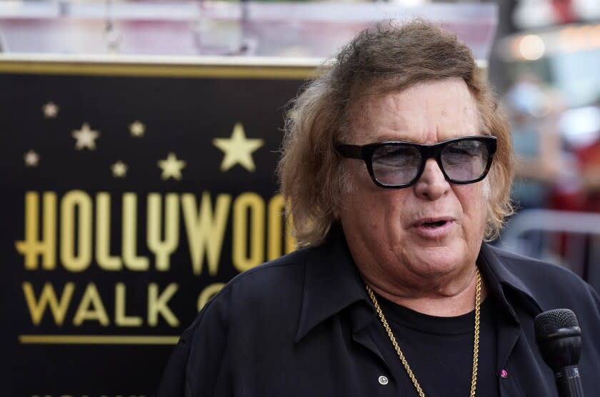 Singer/songwriter Don McLean poses during a ceremony to award him a star on the Hollywood Walk of Fame