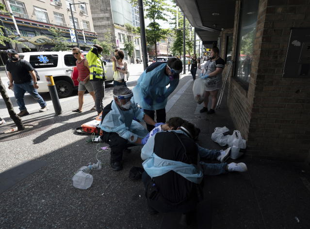 Vancouver men try out a period cramp simulator - Vancouver Is Awesome