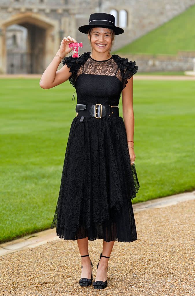 Emma Raducanu receiving her MBE medal