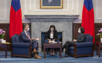 In this photo released by the Taiwan Presidential Office, U.S. Representative Mark Takano, D-Calif. left chats with Taiwanese President Tsai Ing-wen at the Presidential Office in Taipei, Taiwan on Friday, Nov. 26, 2021. Five U.S. lawmakers met with Taiwan President Tsai Ing-wen Friday morning in a surprise one-day visit intended to reaffirm the United States' "rock solid" support for the self-governing island. (Taiwan Presidential Office via AP)