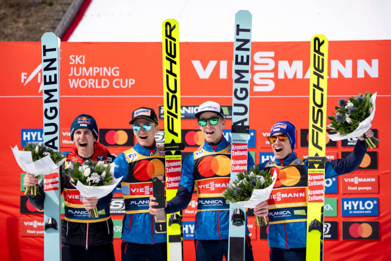 (L-R) Austrian winning Team Daniel Tschofenig, Daniel Huber, Michael Hayboeck and Stefan Kraft poses for a photo on the podium at the FIS World Cup Ski Jumping Finals Team competition in Planica 2024. Andreas Stroh/ZUMA Press Wire/dpa