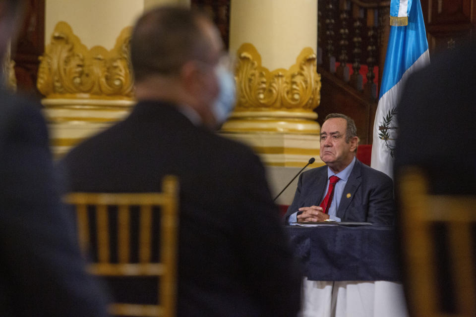 FILE - In this July 27, 2021 file photo, Guatemalan President Alejandro Giammattei attends a press conference at the National Palace in Guatemala City. Guatemala’s Attorney General has opened an investigation into allegations that Giammattei received bribes from Russian businessmen, the prosecutor’s office said on Friday, Sept. 3, 2021. (AP Photo/Oliver de Ros, File)