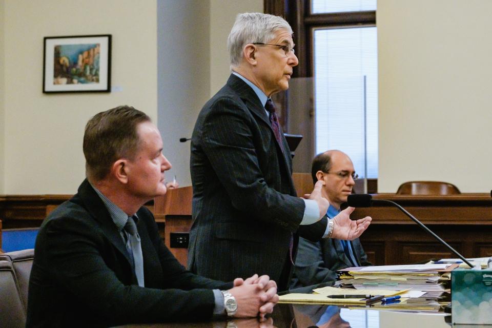 Attorney Peter Cahoon addresses the court during the sentencing hearing of William Timberlake, left, in the Tuscarawas County Court of Common Pleas in New Philadelphia. At right is special prosecutor Thomas Anger, representing the Ohio Auditor of State.