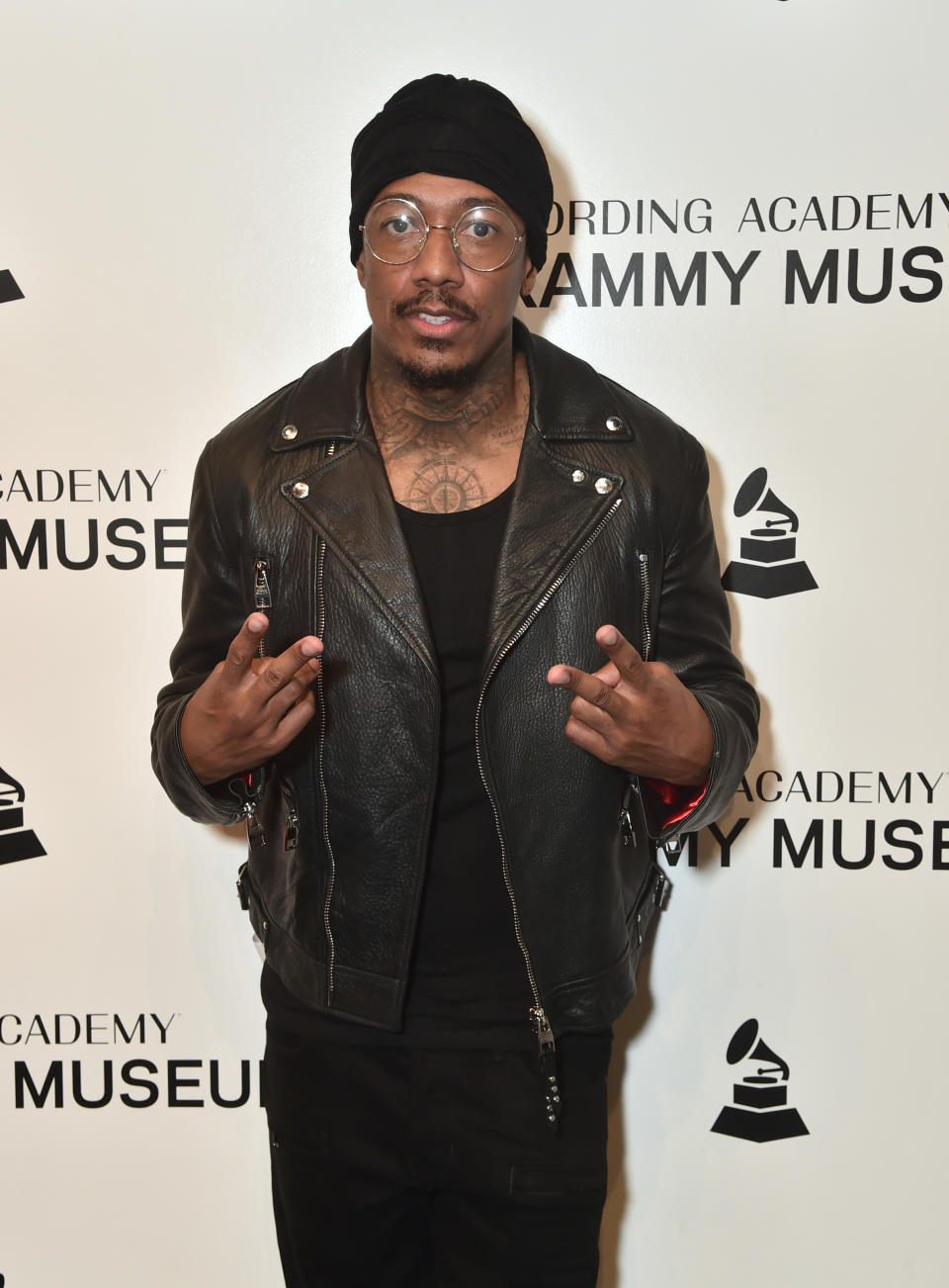 Nick Cannon wearing all Black. 