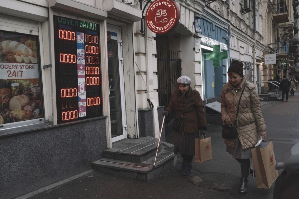 A blank sign supposed to show conversion rates at a currency exchange point at a grocery store in Kyiv, Ukraine on Dec. 19, 2023. (Andrew Kravchenko/Bloomberg via Getty Images)