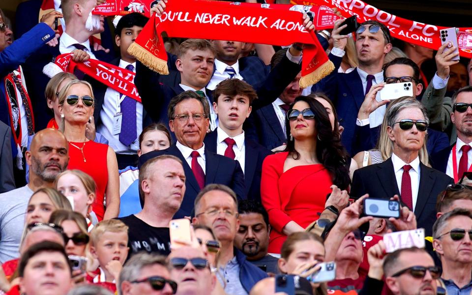 Liverpool owner John Henry (centre row, right), his wife Linda Pizzuti Henry, Tom Werner the chairman of Liverpool and his wife Jennifer Ashton in the stands ahead of the Premier League match at Anfield