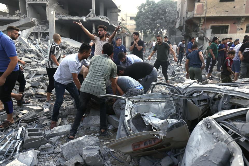 A victim is retrieved on Tuesday following an Israeli airstrike on Rafah. 