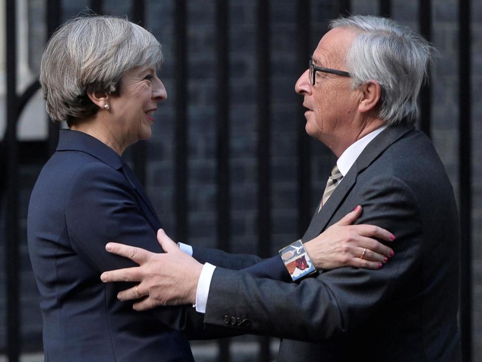 Theresa May and Jean-Claude Juncker at a meeting in April (Reuters)