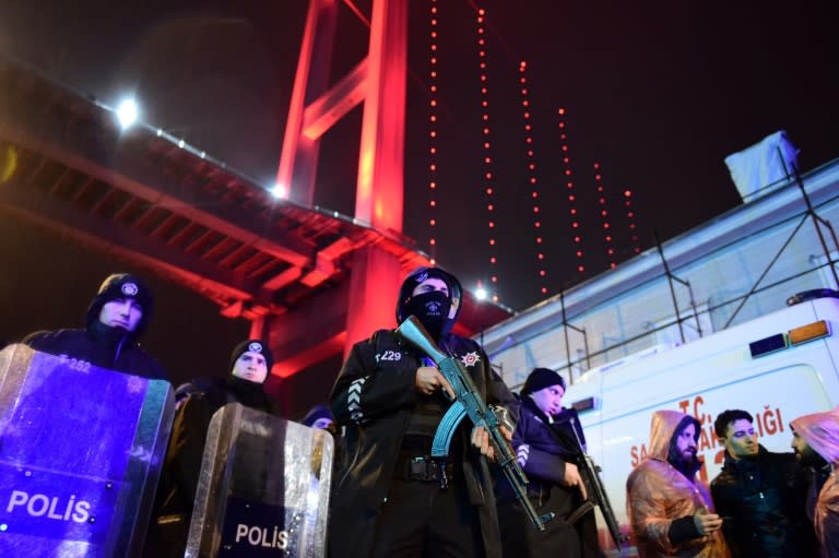 Turkish anti-riot police officers stand guard at the site of an armed attack at an Istanbul nightclub on January 1, 2017