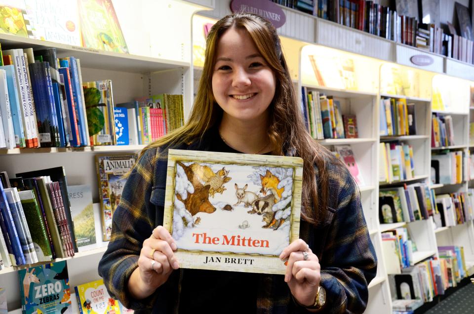 Leah Wright, of McLean and Eakin Booksellers in Petoskey, selected "The Mitten" by Jan Brett as her favorite wintertime read.