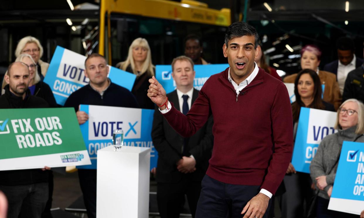 <span>Rishi Sunak speaks to employees at a bus depot during a campaign visit to Derbyshire in March.</span><span>Photograph: WPA/Getty Images</span>